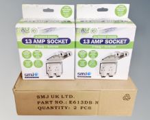 Four SMJ electrical outdoor powered 13 Amp sockets, boxed.