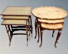 A nest of three Italian piecrust edge tables and further nest of tables