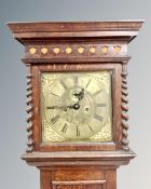 A 19th century oak longcase clock with brass dial,
