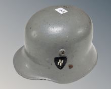 A WWII style German helmet.
