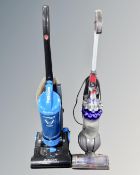 A Dyson animal small ball vacuum together with a Hoover 2000w hurricane vacuum