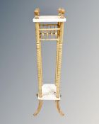 A gilt wood and marble two tier torchere