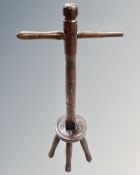 An early 20th century beechwood poss stick
