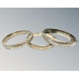 Three antique silver bangles, 51.7g.