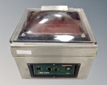 An Avery Berkel 1610T commercial vacuum sealing machine