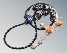 A silver hot diamond necklace with six glass silver beads together with further beaded necklace