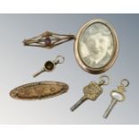 A Victorian sweet heart brooch, together with oval locket,