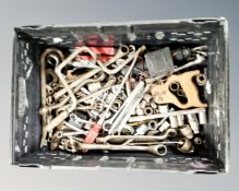 A crate of tools, socket sets, hand saws,