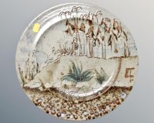 An Aurora project glazed pottery plate
