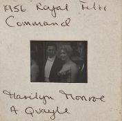 Vintage negative of Marilyn Monroe meeting Queen Elizabeth II.