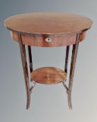 A 19th century oval work table