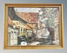 Continental school : Cobbled street, oil on canvas, indistinctly signed,