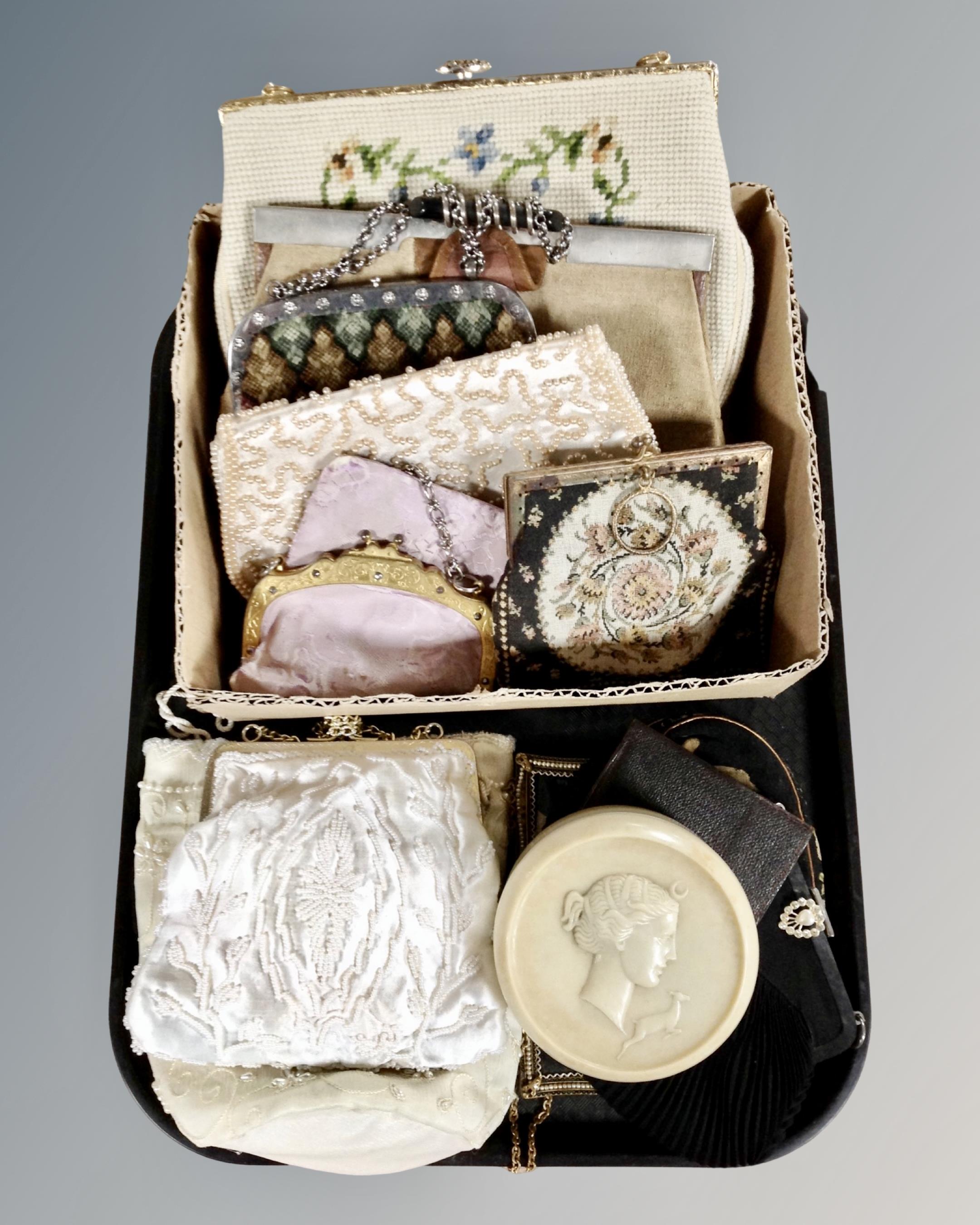 A tray of vintage lady's purses,