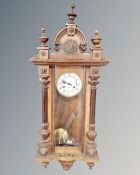 An early 20th century Junghans eight day Vienna style wall clock