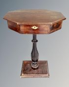 A 19th century pedestal work table