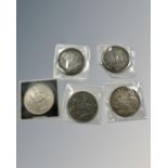 Crown size coins including two 1880 US dollars and a 1935 crown