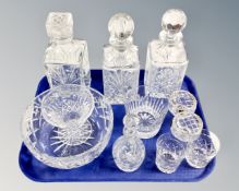 A tray of assorted glass and lead crystal, whisky decanters,