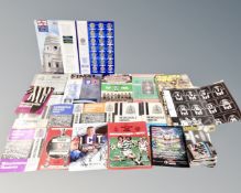 A tray containing a small quantity of Newcastle United football programmes,