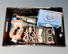 A crate of camping gas stove, avometer,