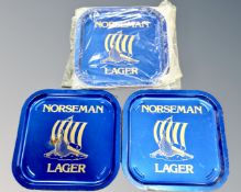 Twelve vintage Norseman lager pub tin trays