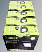 Five Luceco LED flood lights, boxed.