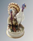 An Italian porcelain figure group of turkeys signed to base.