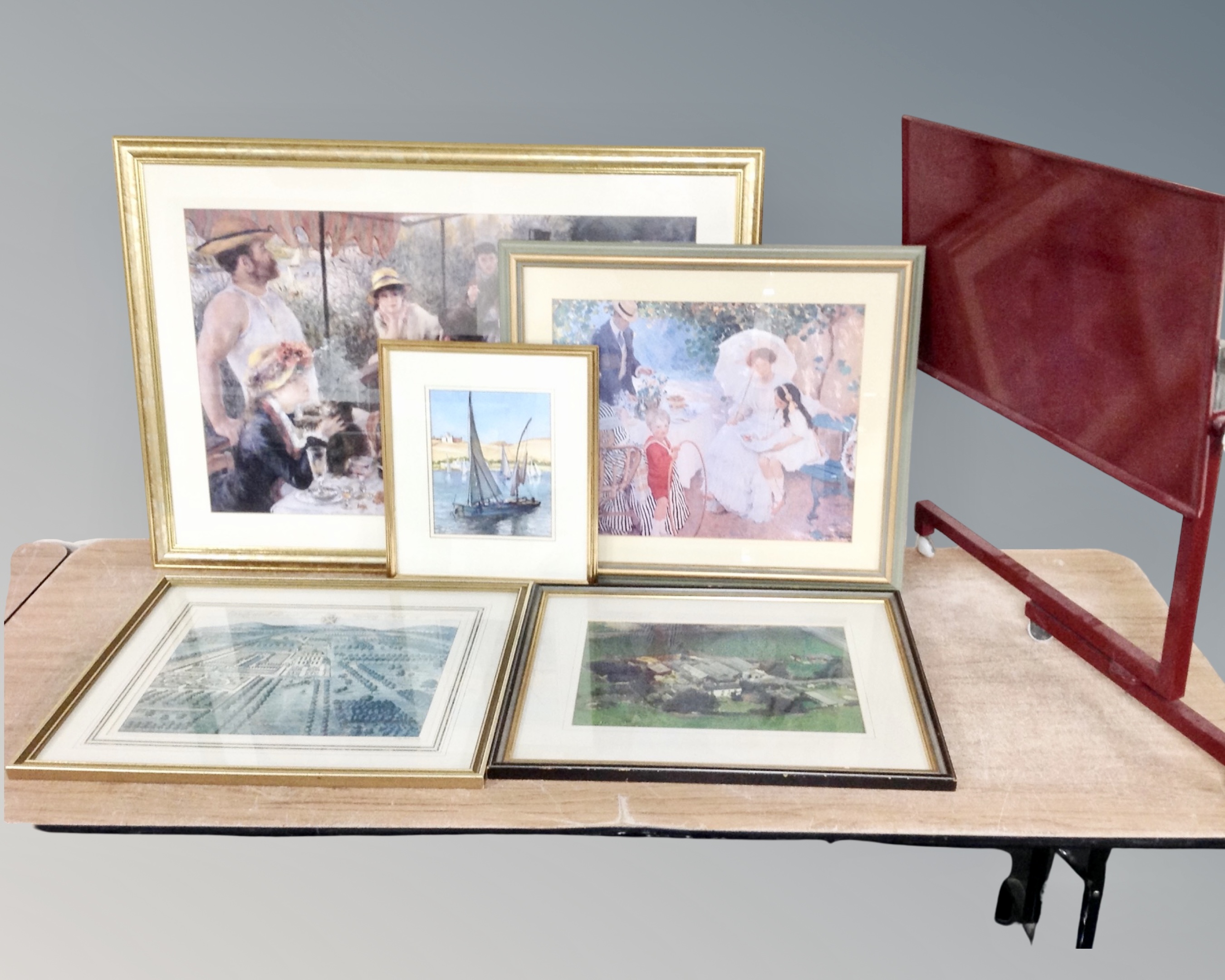 A 20th century painted bed table together with five assorted framed pictures etc