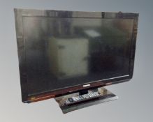 A Toshiba Regza 32 inch LCD TV with remote