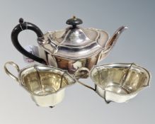 A Sheffield silver plated three-piece tea service, comprising the teapot, sugar bowl and cream jug.