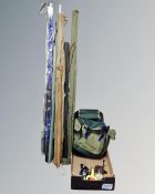 A bundle of assorted fishing rods, Fladen fishing bag, reels, line,