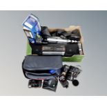 A box containing electricals including a Canon EOS 600 camera with lens,