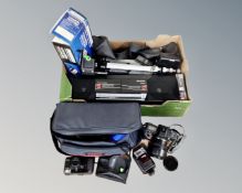 A box containing electricals including a Canon EOS 600 camera with lens,