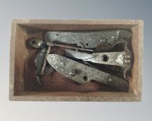 A box of antique gun parts