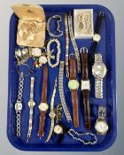 A tray containing assorted costume jewellery, cuff links, lady's and gent's wristwatches,