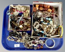 A tray containing a good collection of costume jewellery including bangles, necklaces,