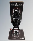 A Lego Star Wars 75274 Tie-Fighter Pilot Helmet with box and instructions.