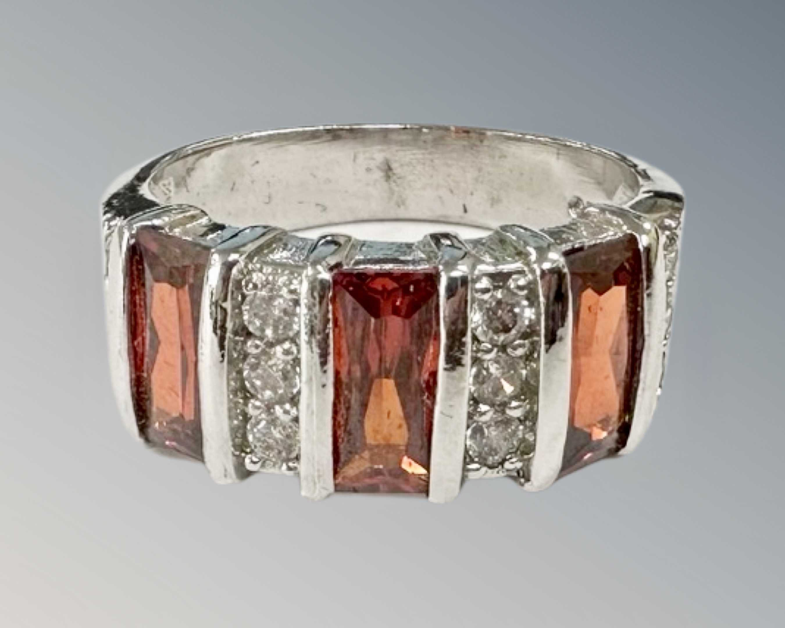 A silver gem-set dress ring, size O/P.