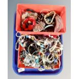 A tray containing a good collection of costume jewellery including bangles, bracelets,