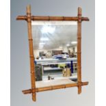 A French Aesthetic movement bamboo framed mirror 72cm by 57cm