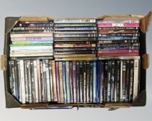 A box of DVD's relating to music to include Led Zeppelin, AC/DC, Mike Oldfield, Taylor Swift,