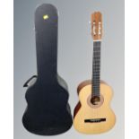 A Spanish acoustic guitar in carry case