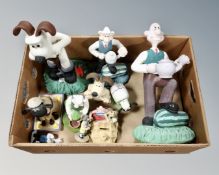 A box of Wallace & Gromit figures