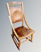 A late Victorian beech rocking chair