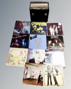 A case containing vinyl records to include Rainbow, The Jam, Fleetwood Mac, The Who, Alice Cooper,