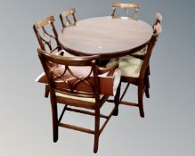 A Bevan Funnell reproduction mahogany oval dining table and six chairs