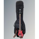 A Bass Centre electric bass guitar in carry bag