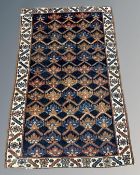 An antique Shirvan rug, South Caucasus, circa 1920, 120cm by 188cm.