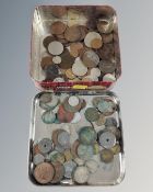 Two tins containing a quantity of 19th and 20th century British and Middle Eastern coinage.