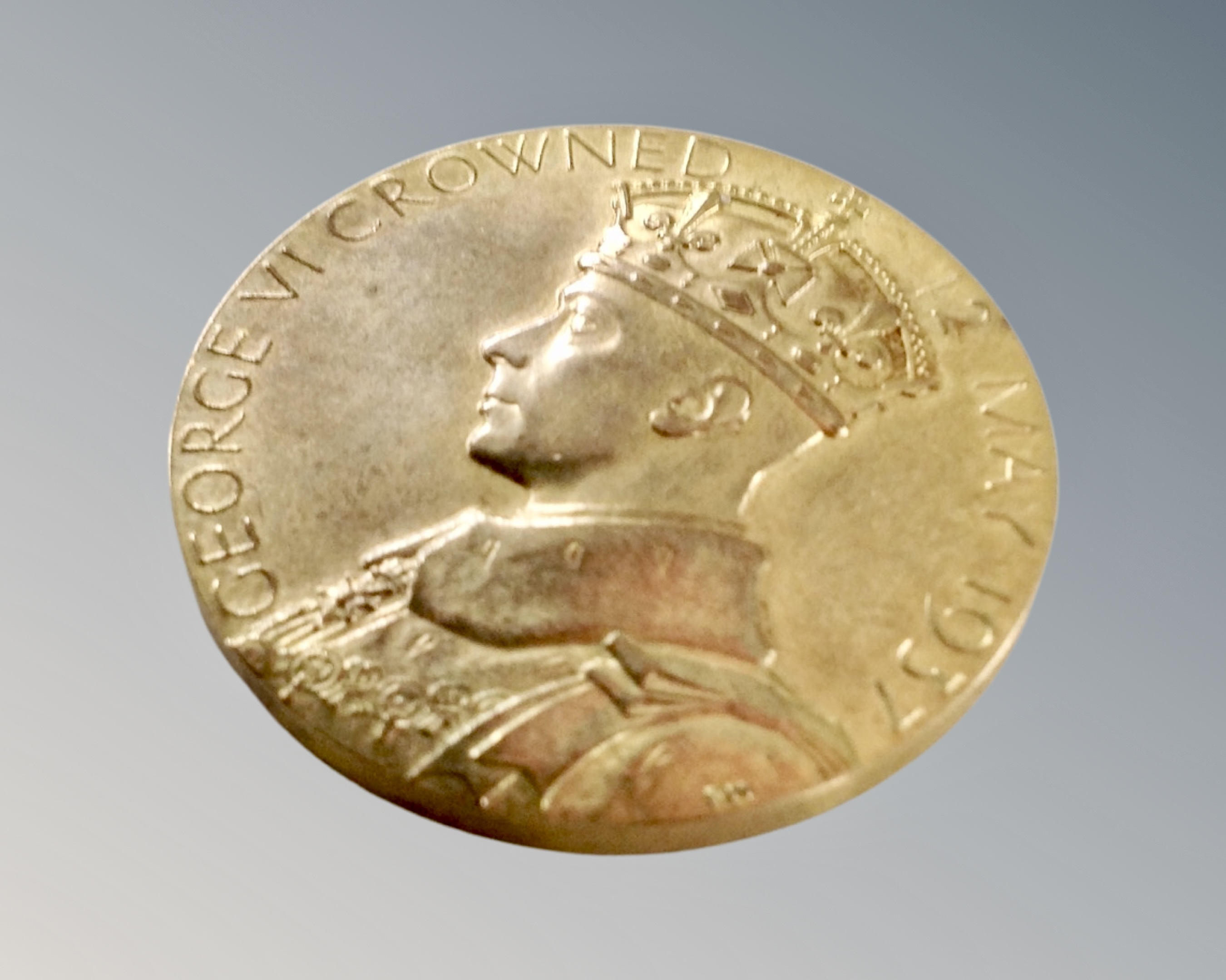 A 1937 gold plated coronation medal