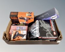 A box containing Coyote Sports cycle helmet, Black and Decker 18v electric drill,